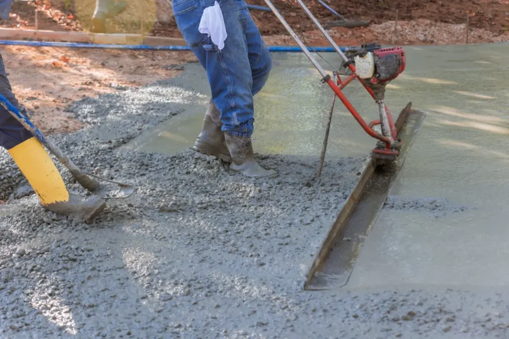 Concrete expert are are working on concrete driveway in cedar rapids, iowa
