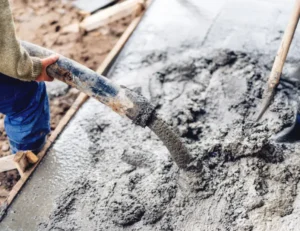 industrial-construction-workers-using-concrete-pumping-in-CR-IOWA